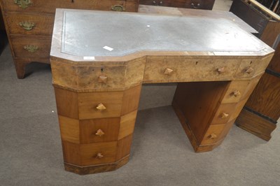 Lot 445 - An Art Deco walnut twin pedestal desk fitted...