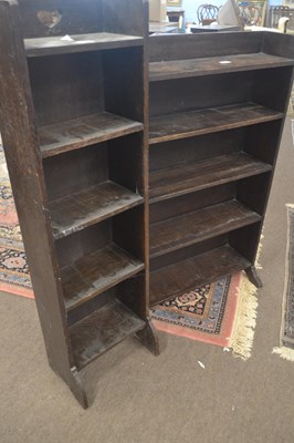 Lot 450 - A Liberty of London narrow oak bookcase with...