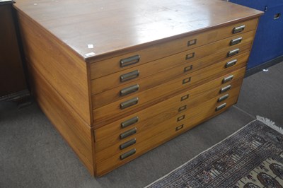 Lot 453 - A modern teak finish eight drawer architects...