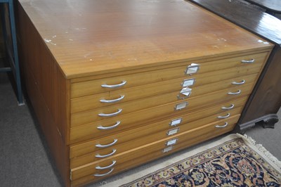 Lot 454 - A modern teak finish eight drawer architects...
