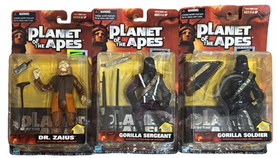 Lot 114 - Three carded Hasbro Planet of the Apes figures,...