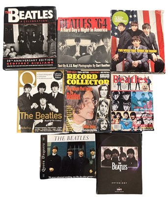 Lot 127 - THE BEATLES: A collection of various books and...