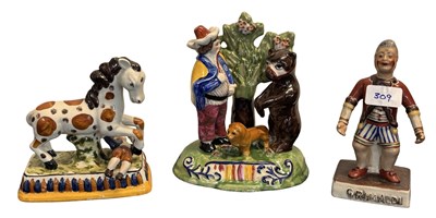 Lot 335 - A group of circus/clown figures, to include...