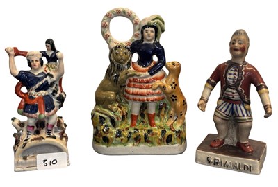 Lot 336 - A group of Staffordshire style circus figures,...