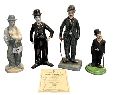 Lot 339 - Four Charlie Chaplin models, to include a...