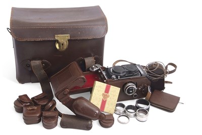 Lot 272 - A Rolleiflex model T twin lens reflex camera,...