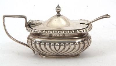 Lot 131 - A late Victorian silver mustard pot and liner,...