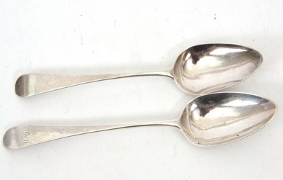 Lot 102 - A pair of George III silver tablespoons, one...