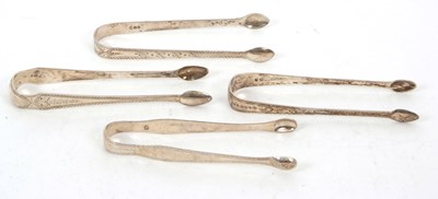 Lot 110 - Four pairs of Georgian bright cut decorated...