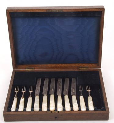 Lot 111 - A case to include six silver mother of pearl...