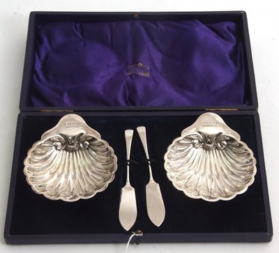 Lot 113 - A cased pair of shell shaped butter dishes,...
