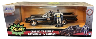 Lot 61 - A boxed die-cast Batmobile and Batman model by...