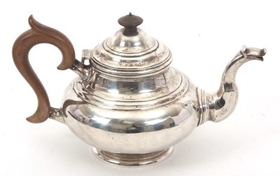 Lot 118 - A George V silver teapot of plain circular...