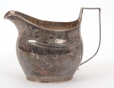 Lot 122 - A Georgian silver helmet shaped cream jug...