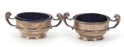 Lot 128 - A pair of twin handle silver open salts and...