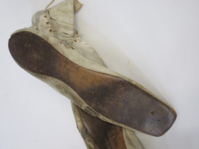Lot 1 - A pair of mid 19th century silk shoes, c.1853,...