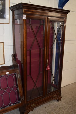 Lot 255 - A 20th Century Sheraton style display cabinet,...