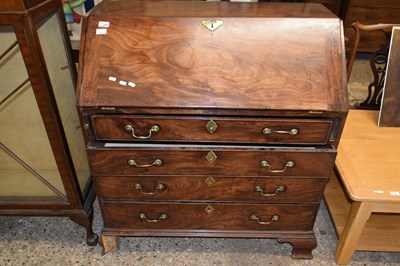 Lot 337 - A George III mahogany bureau, the full front...