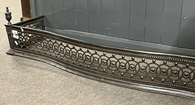 Lot 522 - A Georgian pierced iron fire curb of...