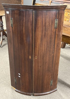 Lot 537 - A George III mahogany bow front wall mounted...