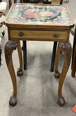 Lot 541 - An early 20th Century lamp table, the top...