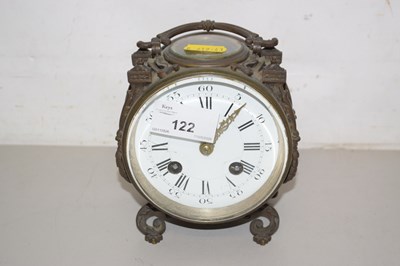 Lot 122 - An unusual continental brass cased table clock,...