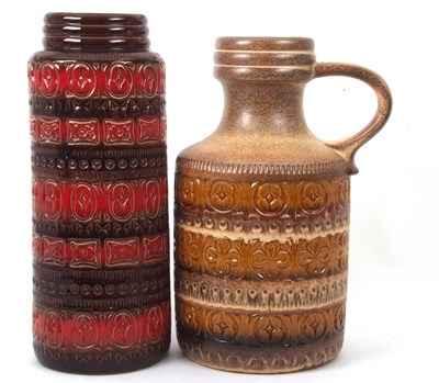 Lot 180 - Two West German vases, both featuring a...