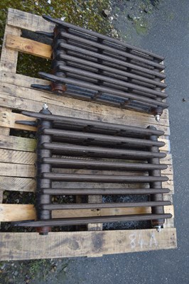 Lot 84a - Two cast iron radiators on legs