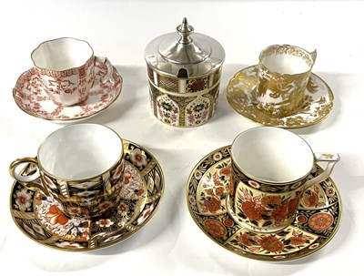 Lot 324 - A group of Royal Crown Derby wares, coffee can...