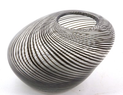 Lot 78 - A vintage glass vase with swirl black swipes...