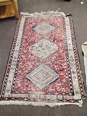 Lot 489 - A 20th Century Afghan Kilim rug decorated with...