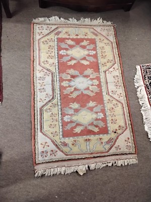 Lot 491 - A small 20th Century Turkish wool floor rug...