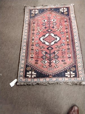 Lot 492 - Small Hamadan rug or prayer mat decorated with...