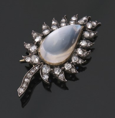 Lot 388 - A moonstone and diamond leaf brooch, the pear...