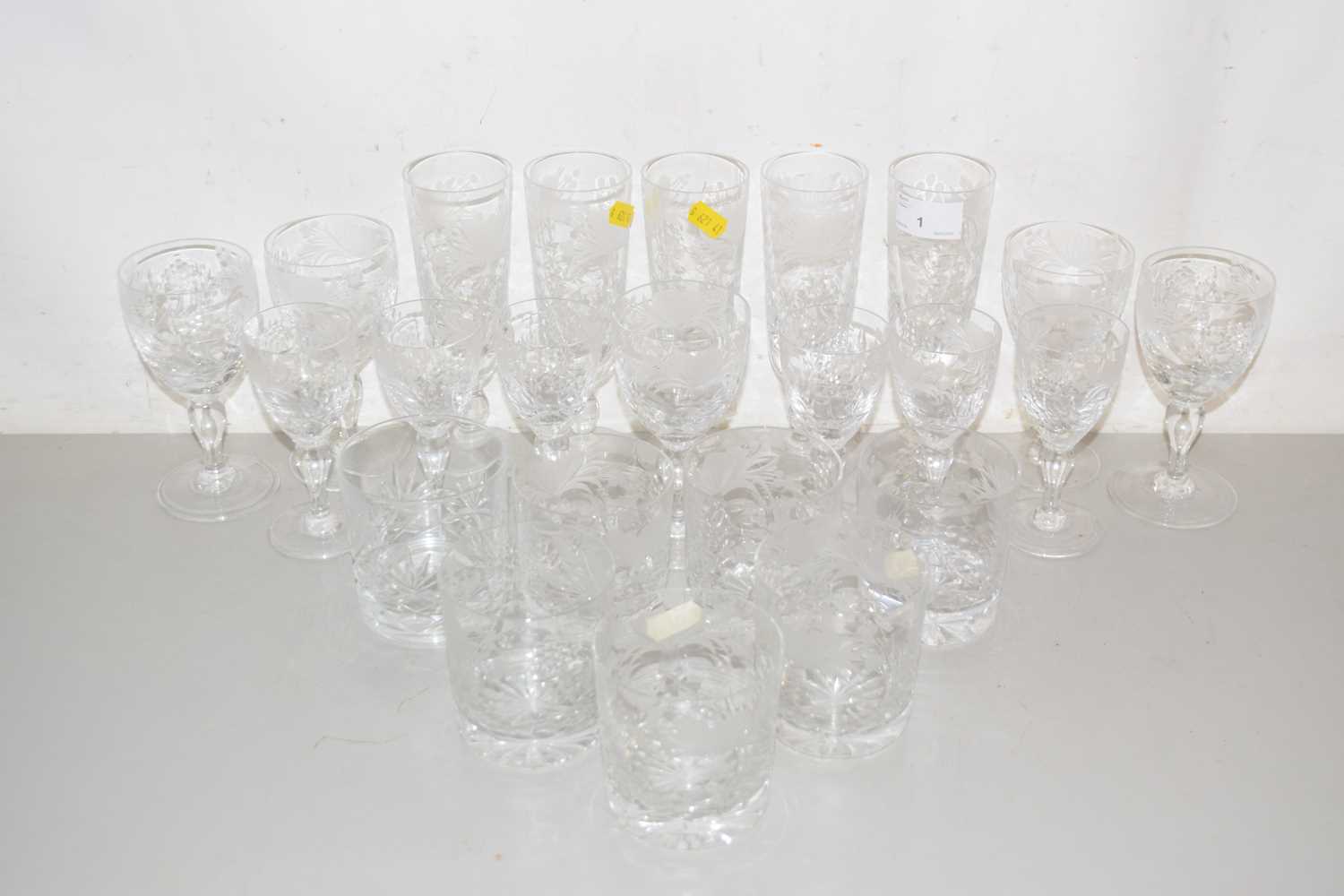 Lot 1 - Set of modern floral engraved drinking glasses...
