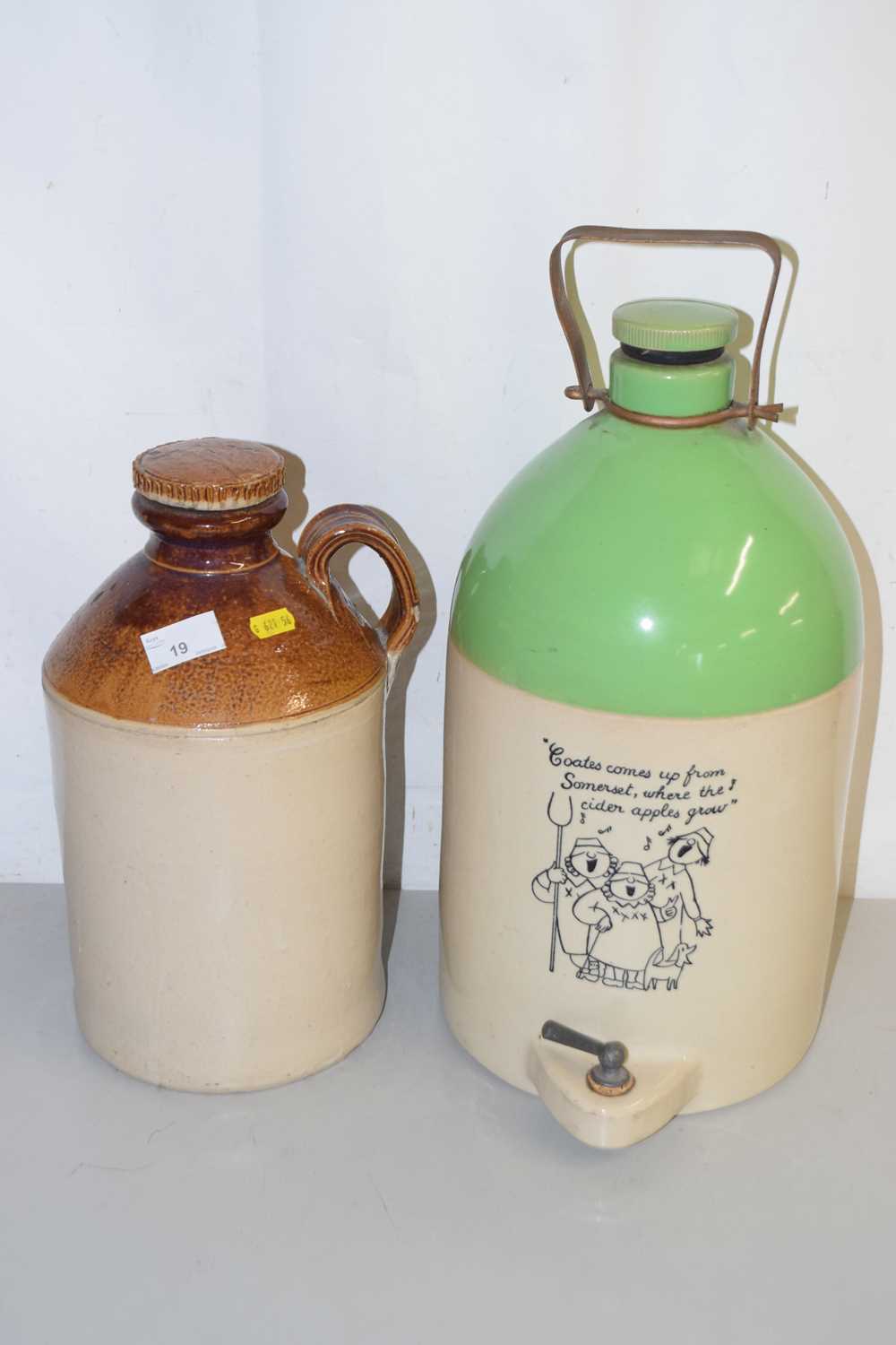 Lot 19 - A Somerset Cider flagon and another plain...