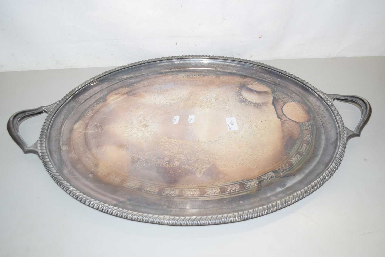 Lot 43 - A large oval silver plated double handled...
