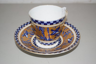 Lot 48 - A Coalport gilt decorated cup and saucer