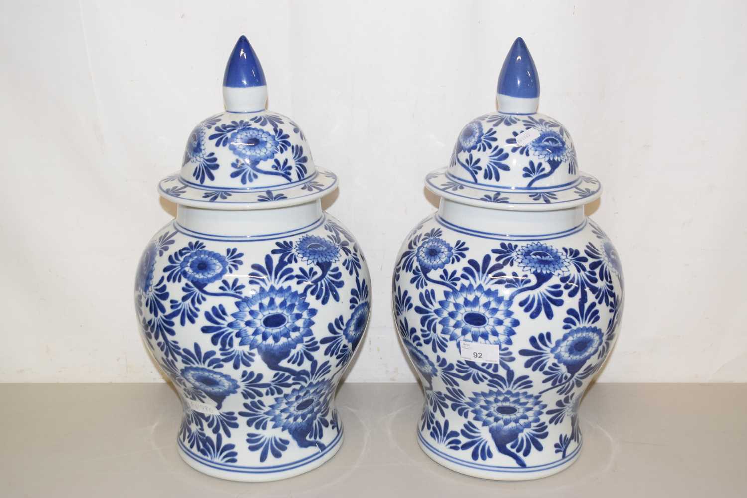Lot 92 - Pair of modern covered blue and white vases