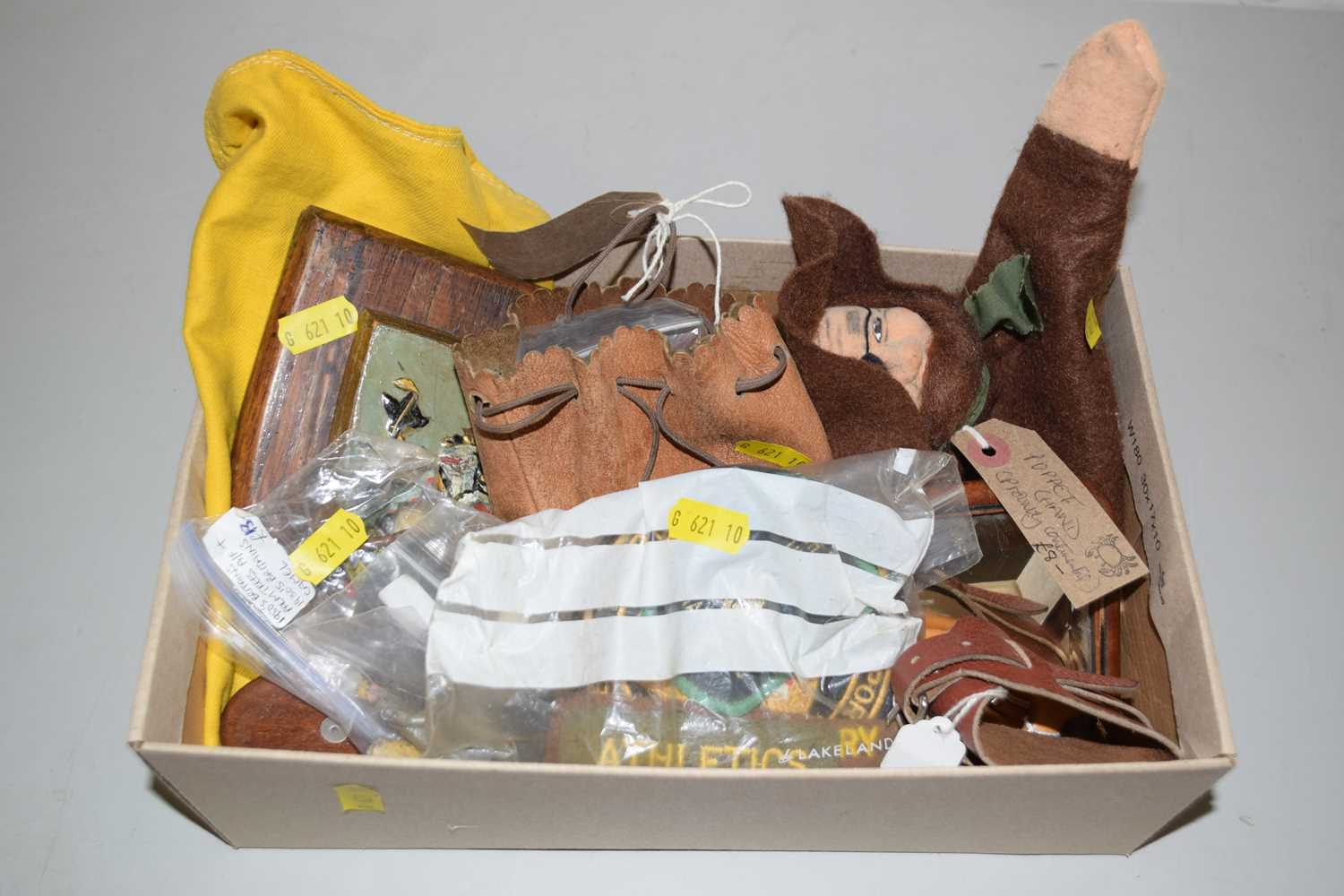 Lot 100 - A box of various mixed items to include glove...