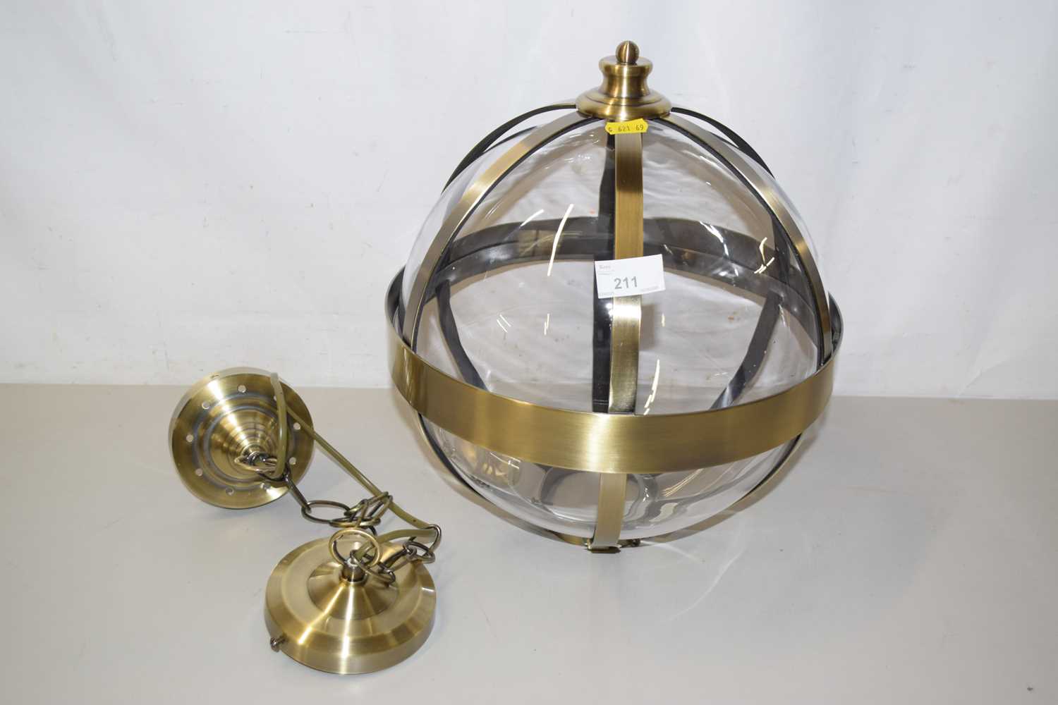 Lot 80 - A modern metal and glass globe formed light...