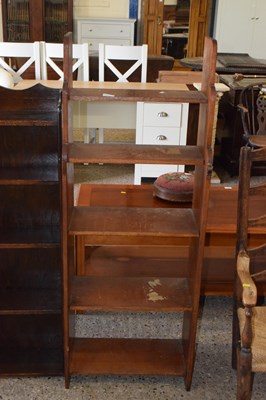 Lot 307 - A 20th Century open front bookcase