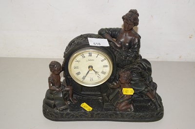 Lot 518 - A resin moulded clock