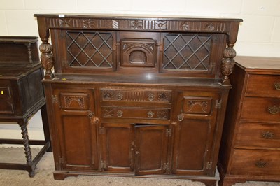Lot 356 - A 20th Century oak court cupboard