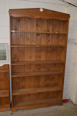 Lot 242 - A pine open front bookcase
