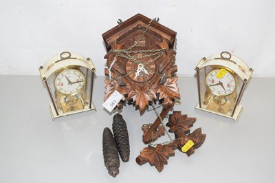 Lot 563 - A cuckoo clock and a pair of mantel clocks