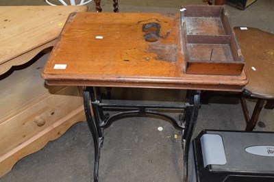 Lot 823 - A former sewing machine stand