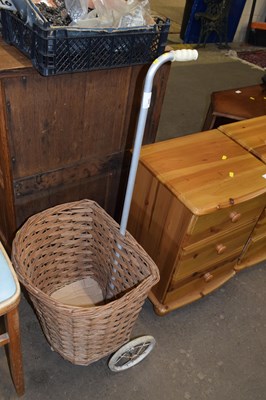 Lot 840 - A wicker shopping trolley