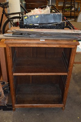 Lot 855 - An oak open front bookcase