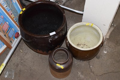 Lot 915 - Two vintage egg crocks and a storage jar